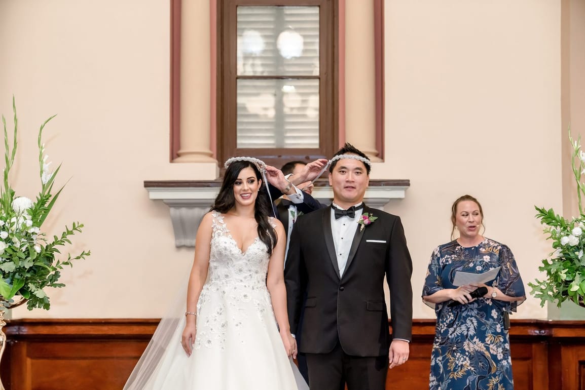 Jason Ng and Adriana Manitaras on their wedding day at Adelaide Town Hall (photo 1 of 2)